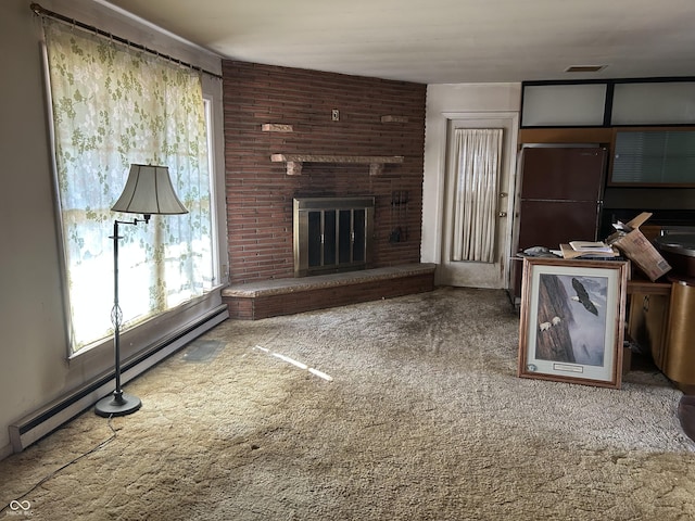 unfurnished living room with a fireplace and a baseboard radiator