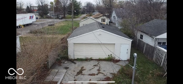 garage with fence