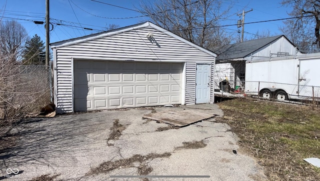 detached garage with fence