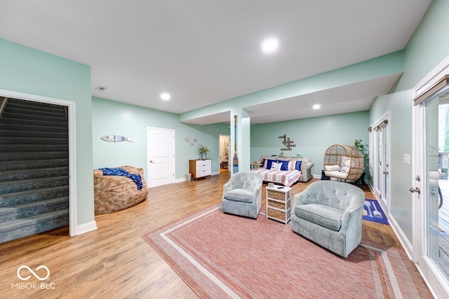 8205 Bass Dr, Nineveh, IN 46164 - living room with wood finished floors, stairs, french doors, baseboards, and recessed lighting