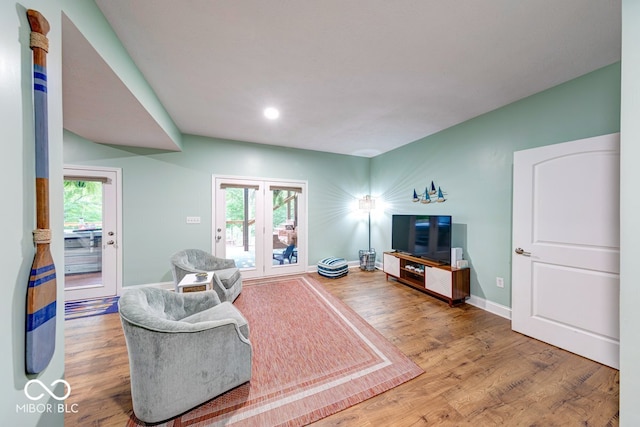8205 Bass Dr, Nineveh, IN 46164 - living room featuring wood finished floors, baseboards, and recessed lighting