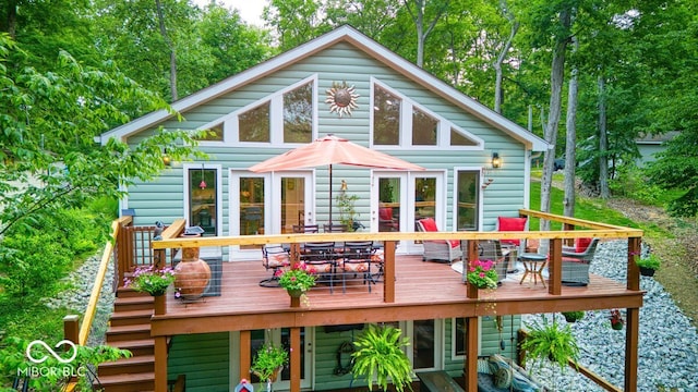 8205 Bass Dr, Nineveh, IN 46164 - rear view of house featuring outdoor dining area and a wooden deck