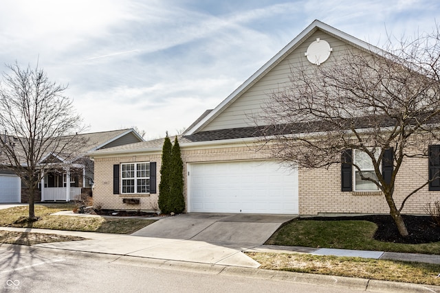 view of front of home with concrete driveway, an attached garage, brick siding, and roof with shingles