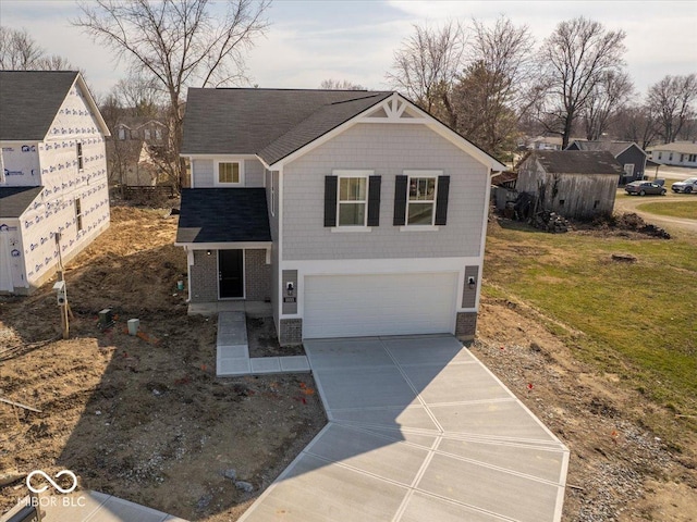 view of front of home featuring brick siding, concrete driveway, and an attached garage