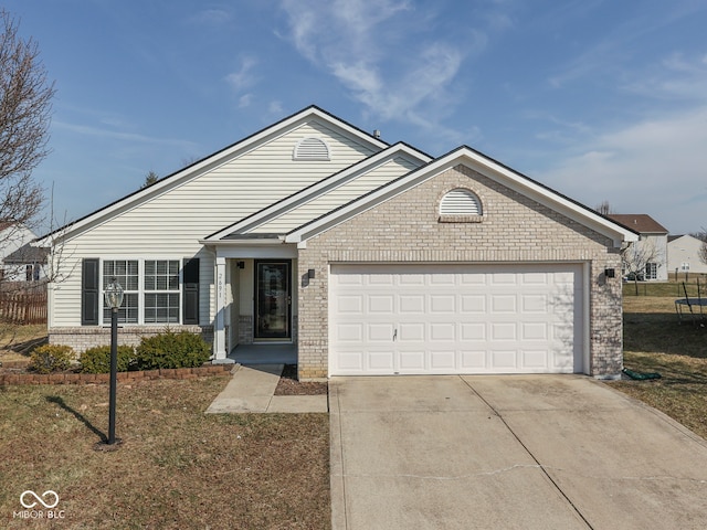 ranch-style home with driveway, a trampoline, fence, a garage, and brick siding