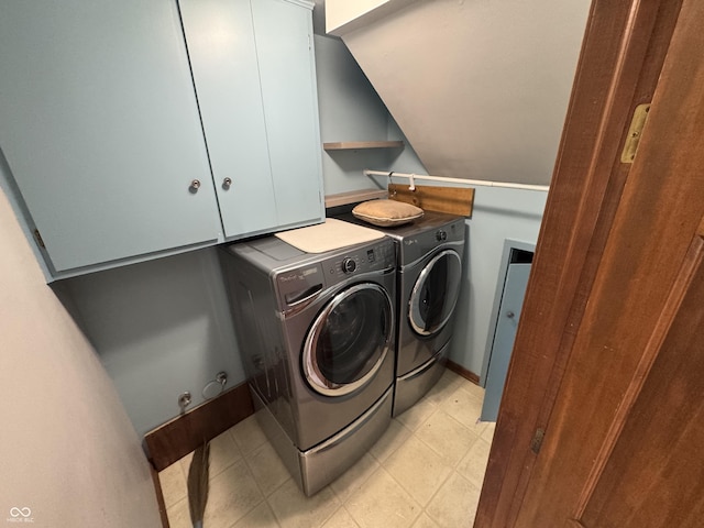 laundry area featuring cabinet space and independent washer and dryer