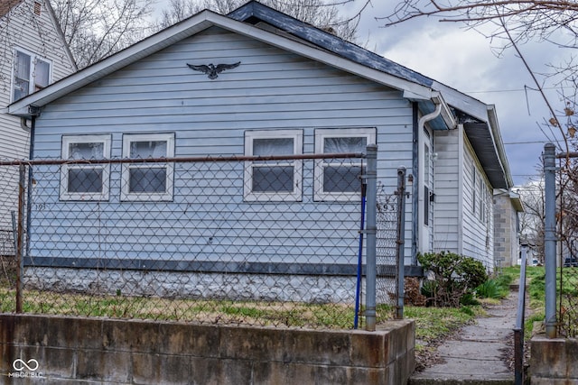 view of property exterior with fence