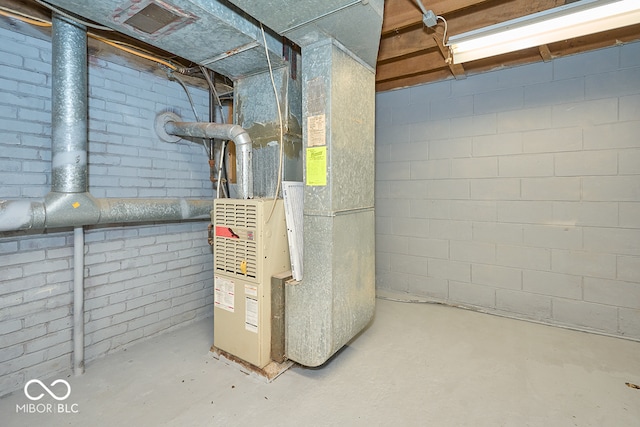 utility room with heating unit