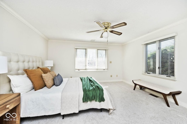 bedroom featuring multiple windows, carpet, and crown molding