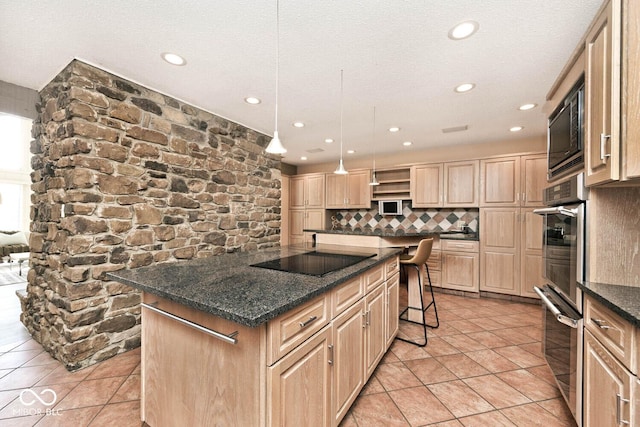 kitchen featuring light brown cabinets, open shelves, a kitchen island, a breakfast bar area, and black electric stovetop