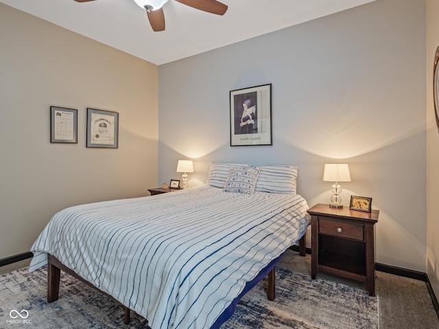 bedroom featuring baseboards, carpet, and a ceiling fan