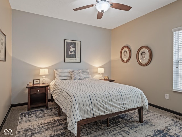 bedroom featuring visible vents, baseboards, and ceiling fan