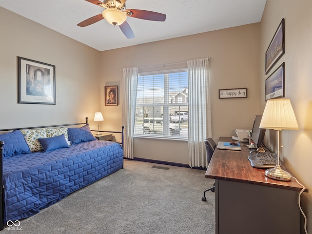 bedroom with baseboards, visible vents, carpet floors, and ceiling fan