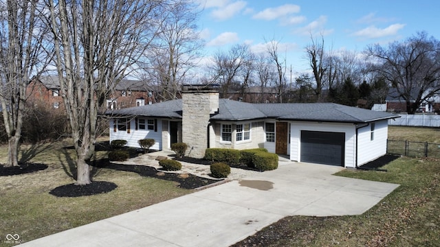 ranch-style house with a front lawn, fence, a chimney, a garage, and driveway