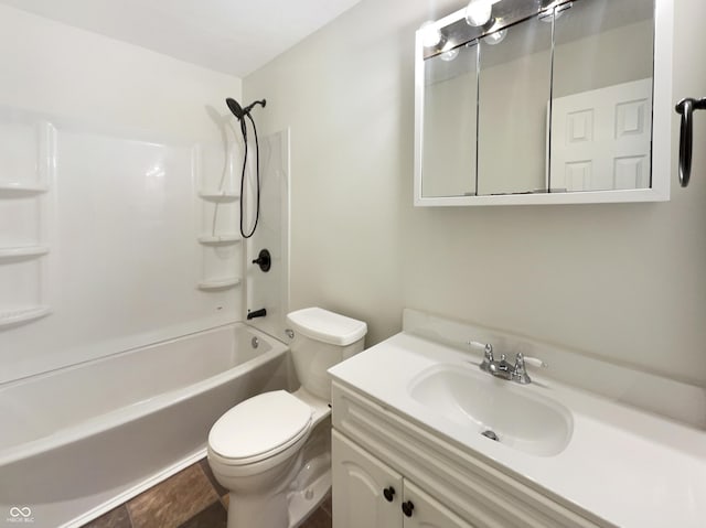 full bathroom featuring toilet, vanity, and shower / bathing tub combination