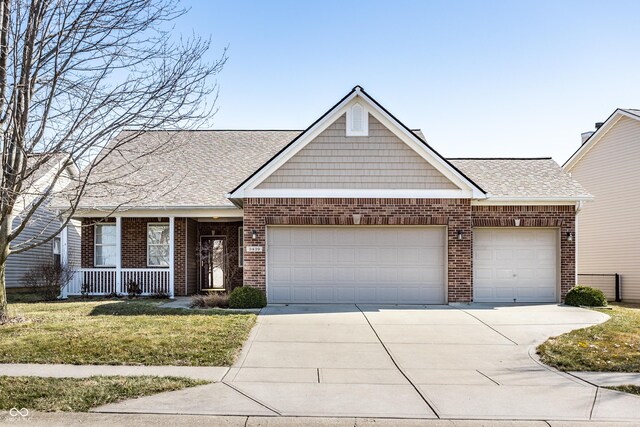 view of front of house featuring brick siding, concrete driveway, a shingled roof, and a garage