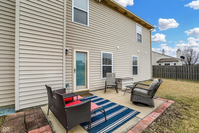 view of patio featuring fence