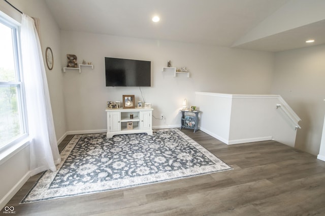 12145 Bubbling Brook Dr Unit 600, Fishers, IN 46038 - living room featuring wood finished floors, baseboards, recessed lighting, and vaulted ceiling