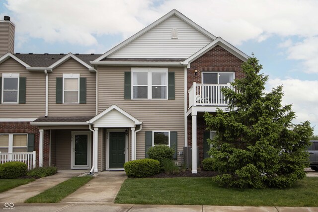 12145 Bubbling Brook Dr Unit 600, Fishers, IN 46038 - view of property with brick siding