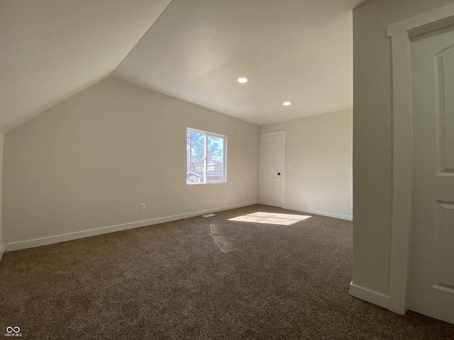 additional living space with recessed lighting, baseboards, carpet floors, and lofted ceiling