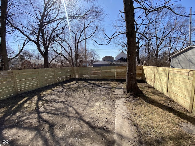 view of yard featuring a fenced backyard