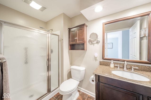 bathroom with baseboards, a shower stall, vanity, and toilet