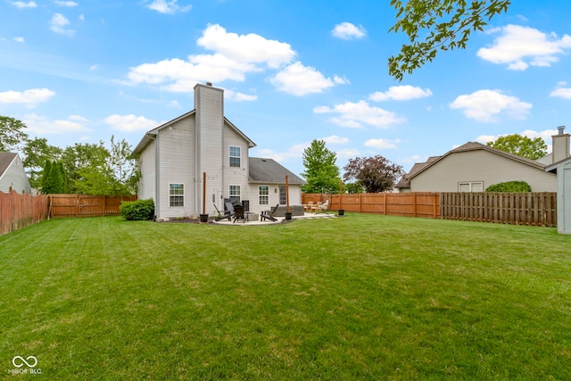 12612 Clearview Ln, Indianapolis, IN 46236 - rear view of property with a patio area and a chimney
