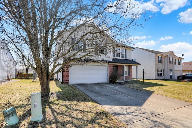 traditional-style home with fence, concrete driveway, a front yard, a garage, and brick siding