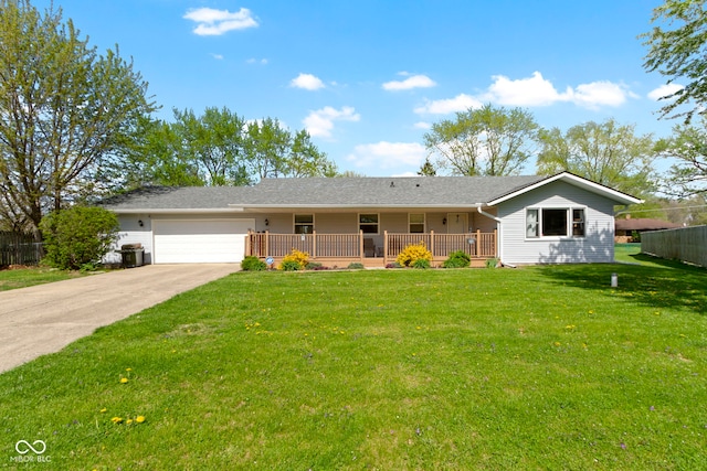single story home with concrete driveway, an attached garage, fence, and a front lawn