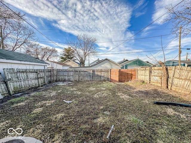 view of yard featuring a fenced backyard