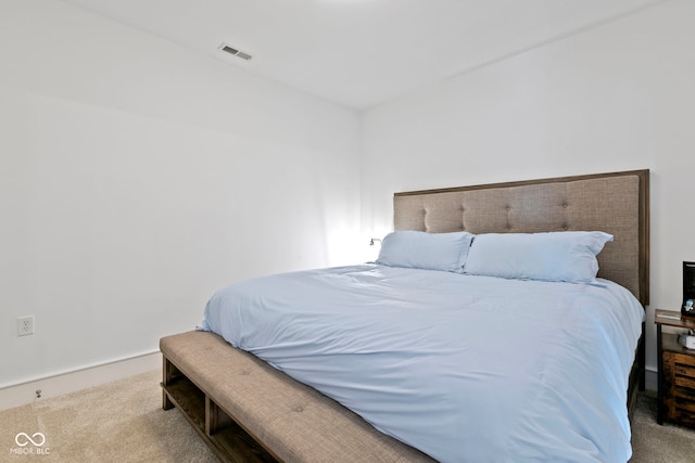 bedroom featuring visible vents and carpet floors