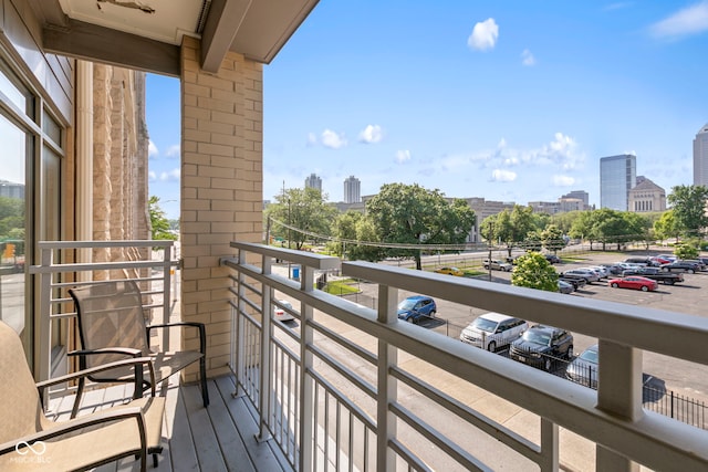 balcony featuring a view of city