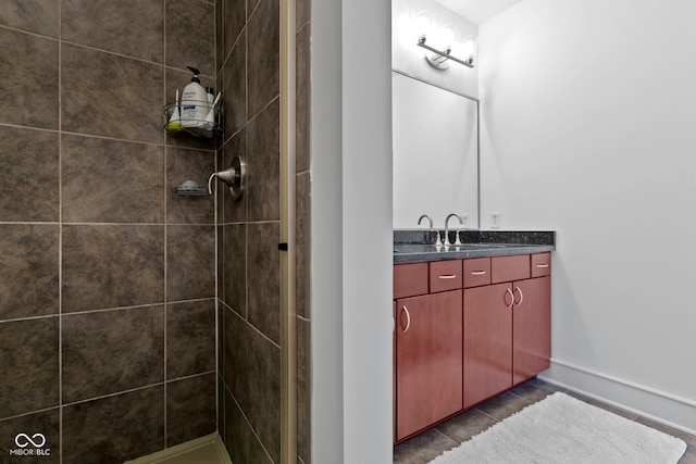 bathroom featuring vanity and a stall shower