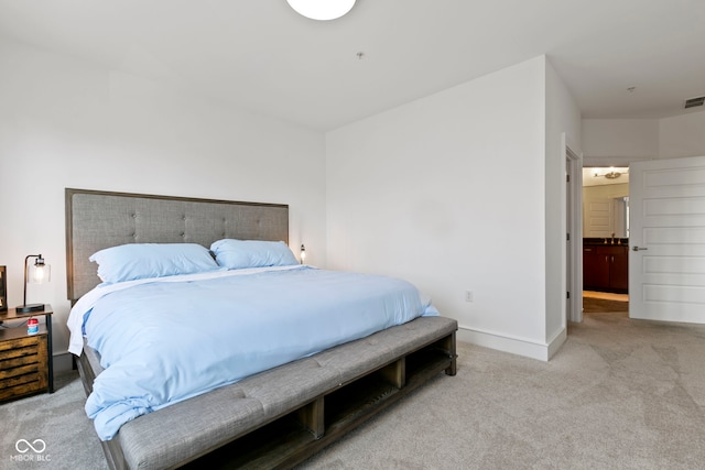 bedroom featuring baseboards, carpet floors, and visible vents