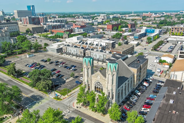 birds eye view of property with a city view