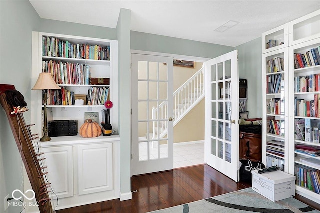 interior space featuring french doors and wood-type flooring