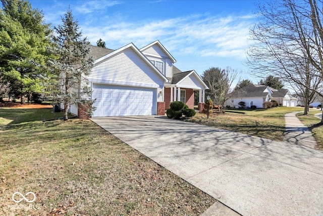 view of front of house featuring brick siding, an attached garage, concrete driveway, and a front yard