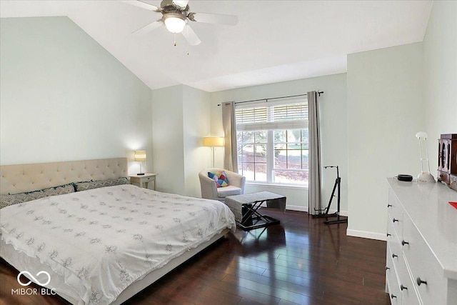 bedroom with baseboards, dark wood-type flooring, ceiling fan, and vaulted ceiling