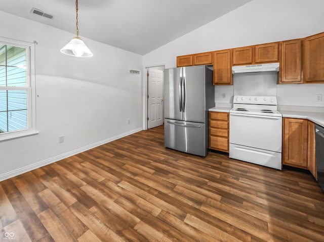 kitchen with under cabinet range hood, brown cabinets, stainless steel appliances, and light countertops