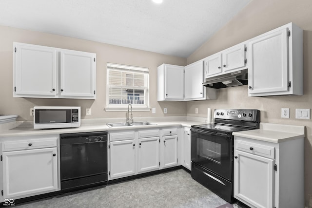 kitchen with black appliances, under cabinet range hood, a sink, white cabinets, and lofted ceiling