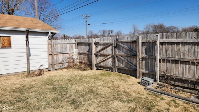 view of yard with a gate and fence