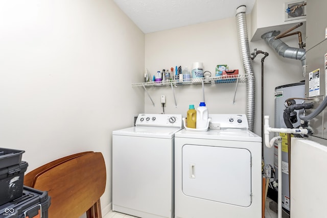 washroom with laundry area and washing machine and clothes dryer