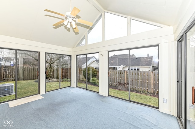 unfurnished sunroom with lofted ceiling and a ceiling fan