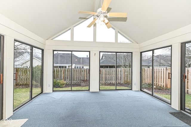 unfurnished sunroom with lofted ceiling and plenty of natural light