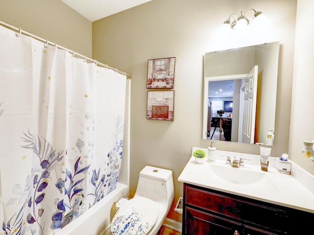 full bath featuring vanity, toilet, and shower / bath combo