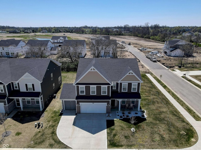 drone / aerial view with a residential view