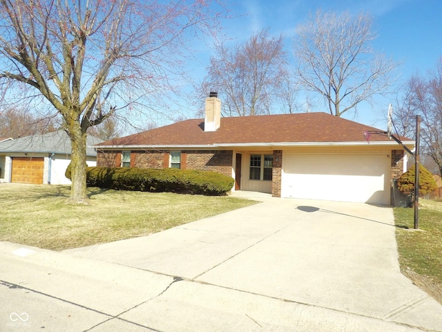 ranch-style house featuring driveway, an attached garage, a chimney, a front lawn, and brick siding