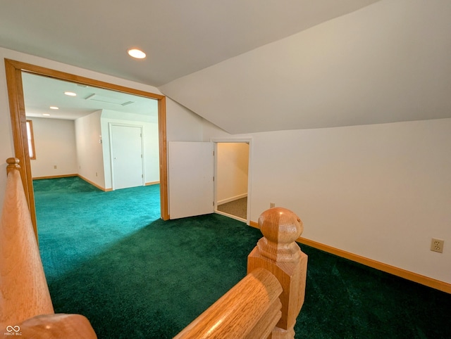 interior space with recessed lighting, baseboards, lofted ceiling, and carpet flooring