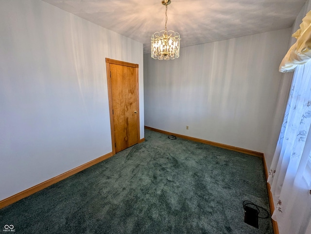 unfurnished room with an inviting chandelier, baseboards, and carpet floors