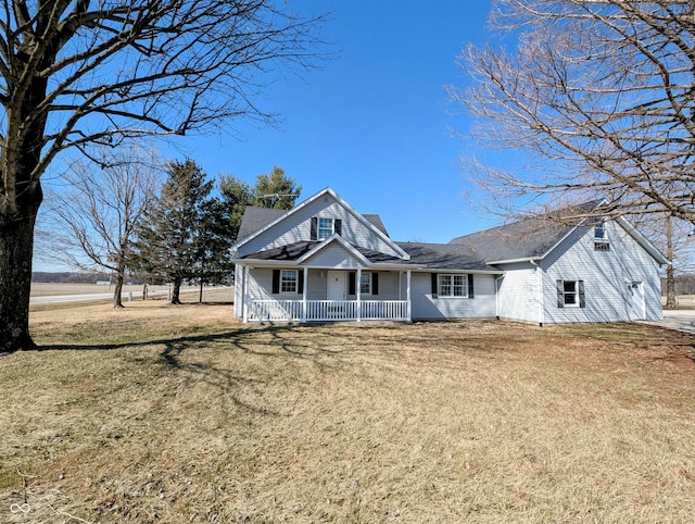 view of front facade with a porch and a front yard